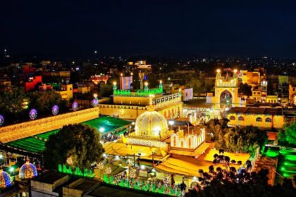 Ajmer Sharif dome and surrounding courtyard illuminated at night