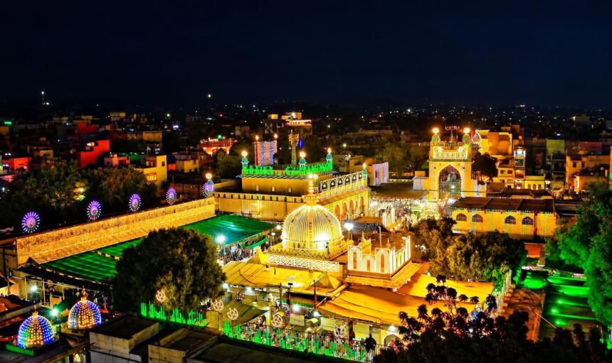 Ajmer Sharif dome and surrounding courtyard illuminated at night