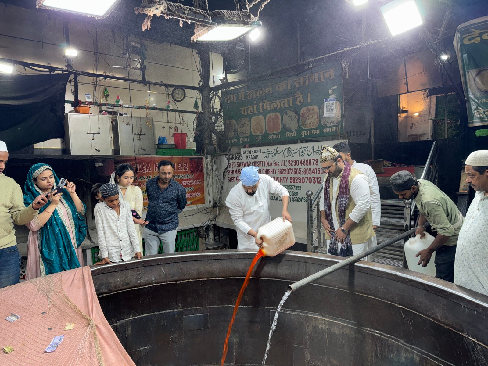 Overhead view of a large cooking cauldron filled with rice at Dargah Sharif